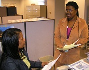 A Visually Impaired person is working in an office